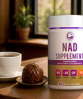Legrano NAD Supplement bottle on table with coffee — lifestyle shot of 60-capsule cellular energy and brain health formula